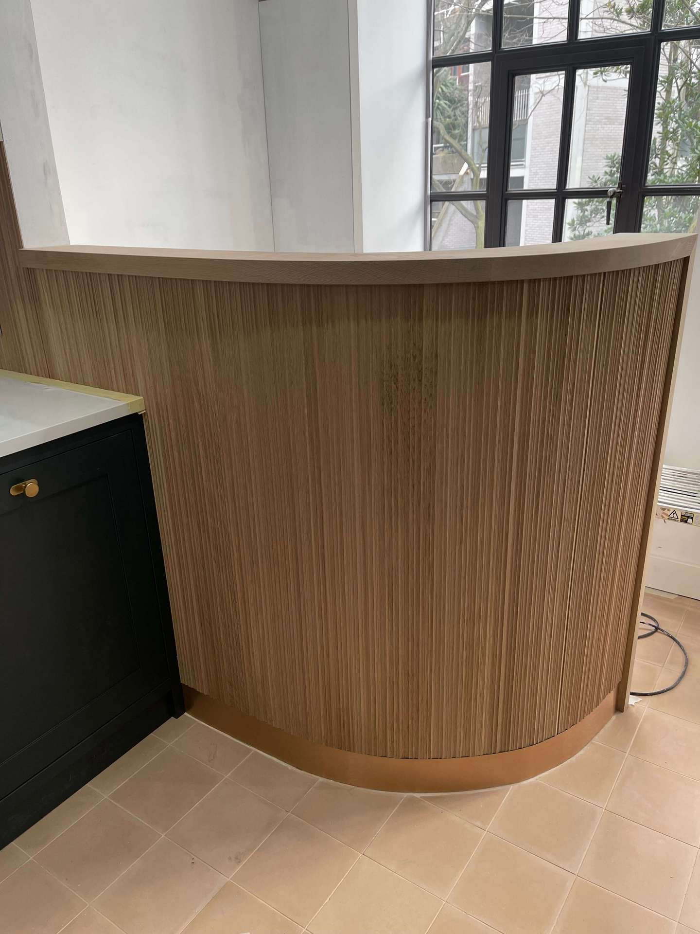 Curved oak ribbed panel